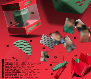 Green and red dice with packaging and promotional materials on a red background