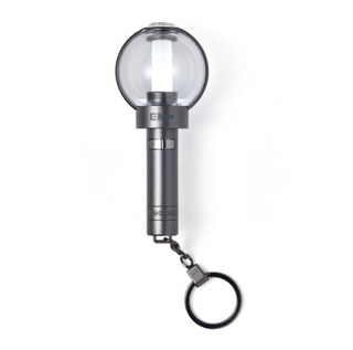 Keychain light with clear glass cover on a white background