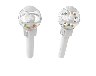 Two gumball machine toys on white background