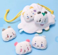 Set of cute plush toys resembling cartoon characters on a light blue background