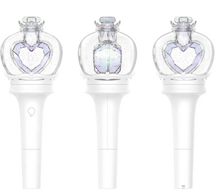 Three clear bottle-shaped hair clips with heart designs on a white background