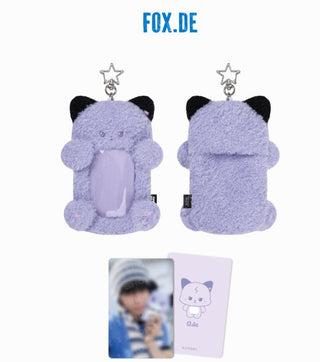 Purple plush keychain with black ears and a star tag, displayed on a white background with 'FO X.DE' branding. Xdinary Monsters REEL HOLDER official merchandise