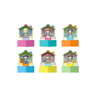Set of colorful toy houses with character figures on a white background
